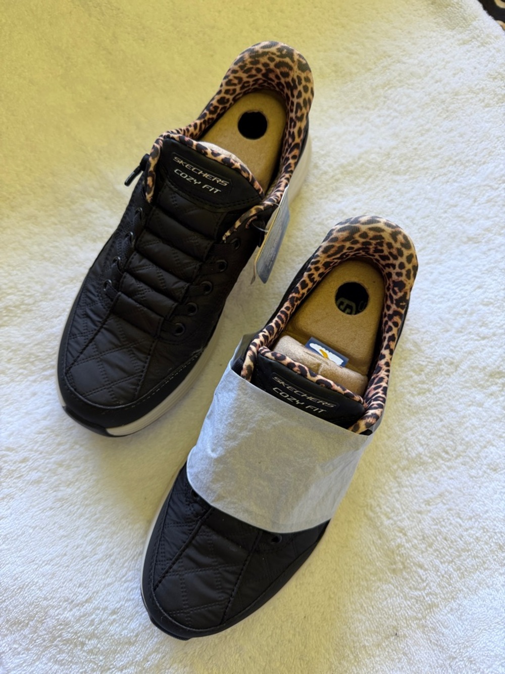 Skechers Black Slip-On Quilted Sneakers with Leopard Trim